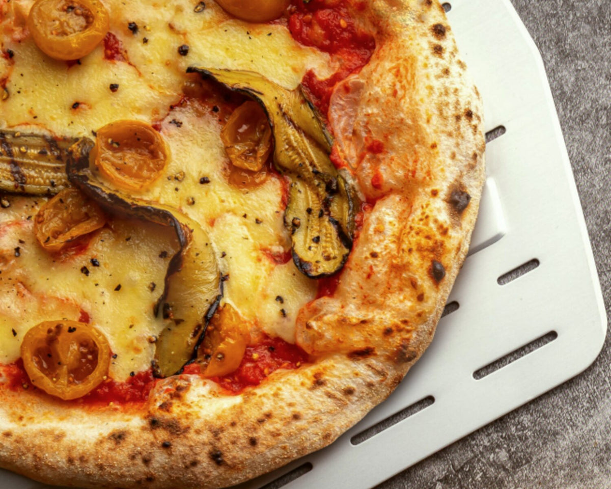 Ooni's Flame Cooked Courgette and Cherry Tomato Pizza