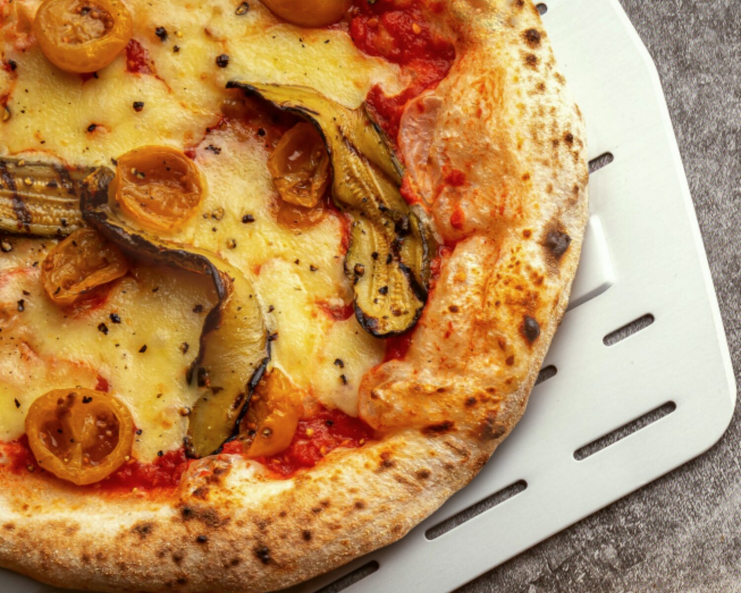 Ooni's Flame Cooked Courgette and Cherry Tomato Pizza