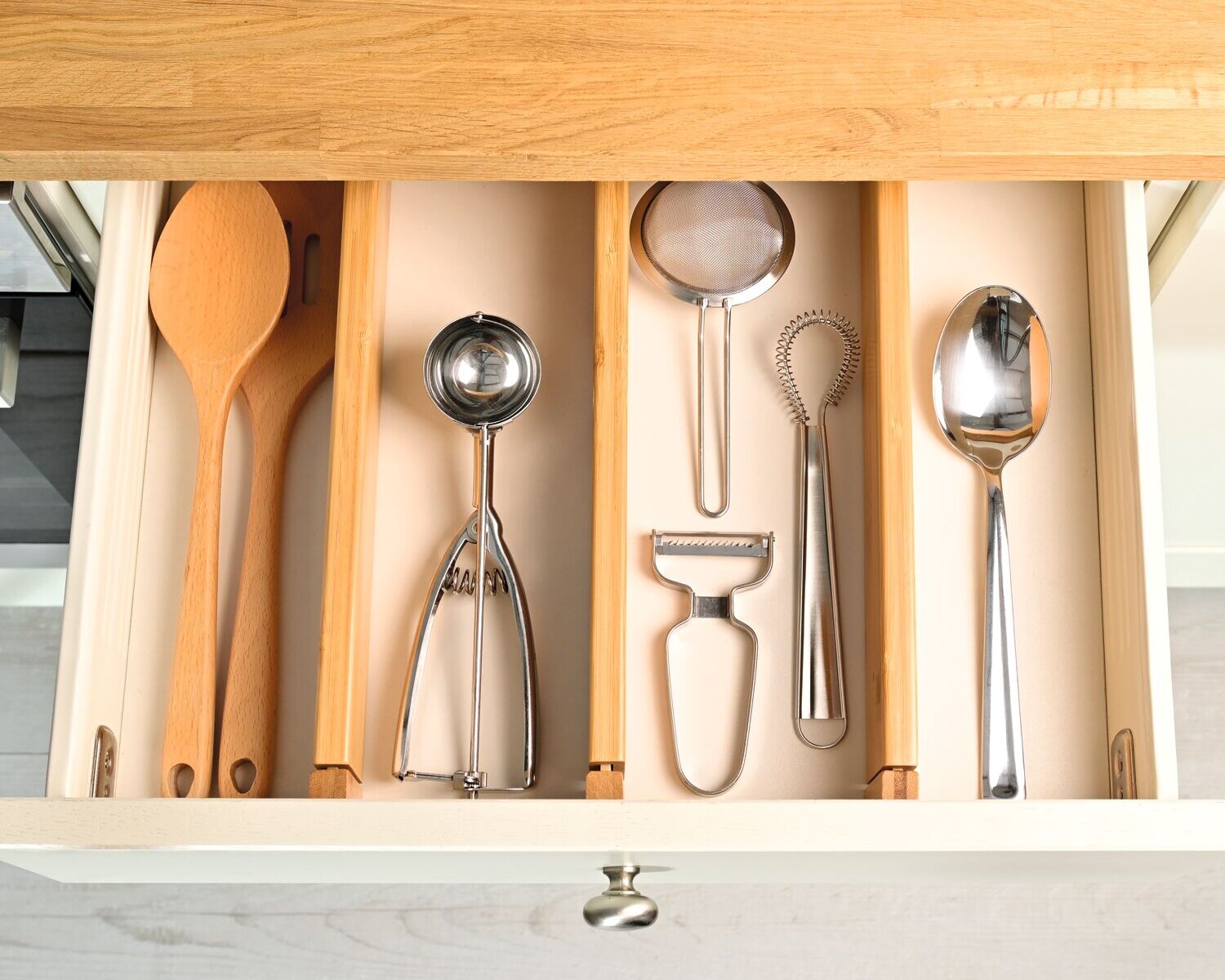Kitchen drawer organiser for improved small kitchen storage