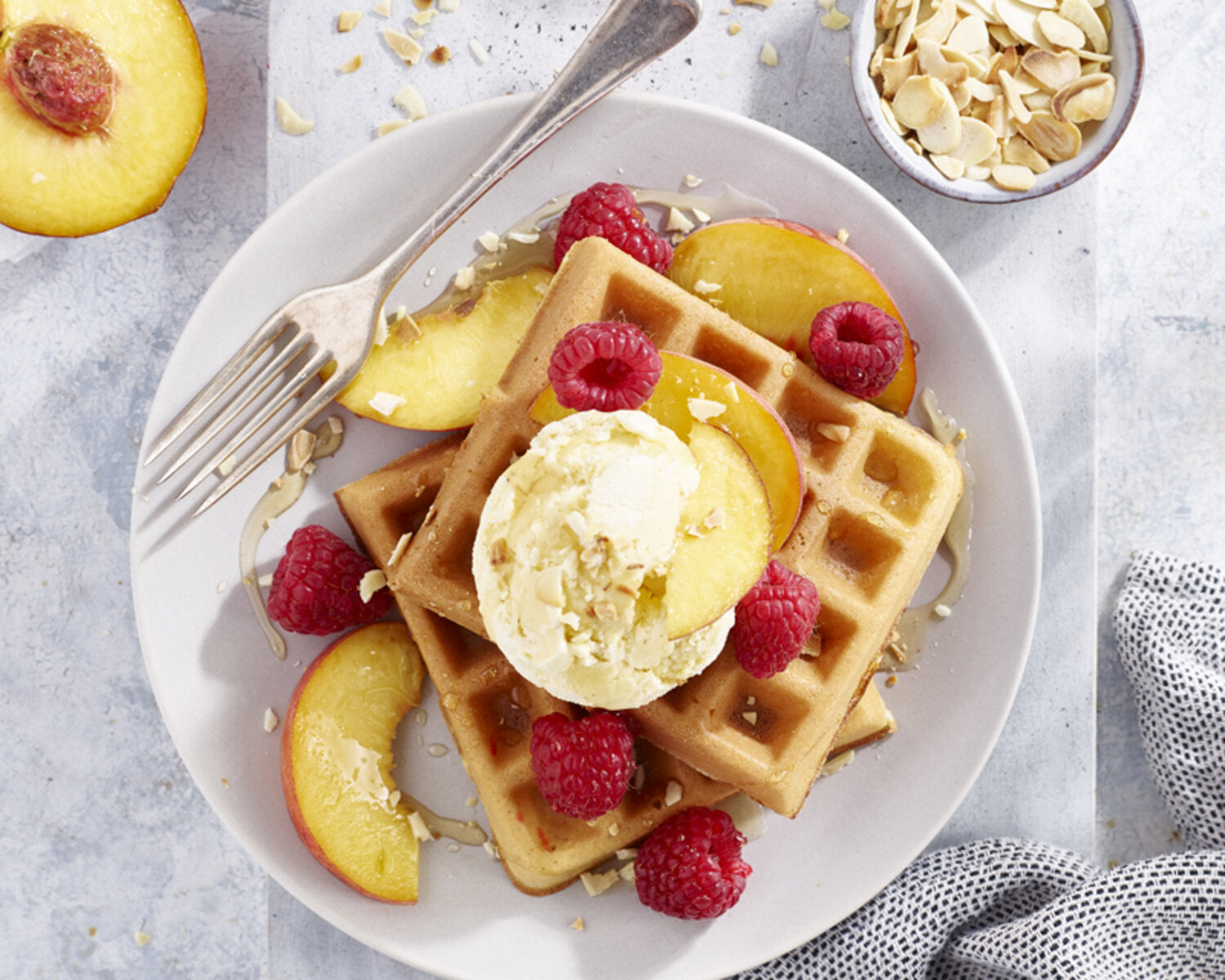 Waffles with ice cream and fruit and oats in a bowl made in a waffle maker