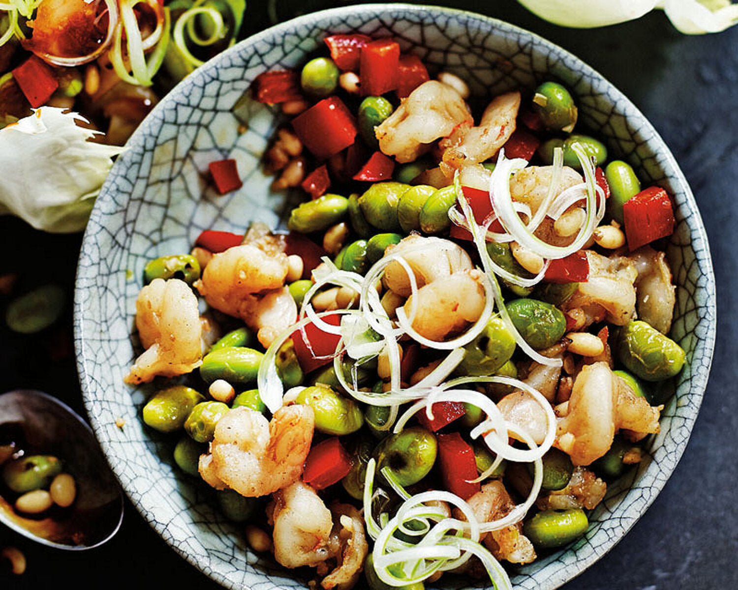 School of Wok stir-fried Prawn, Edamame & Pine Nut Lettuce wraps