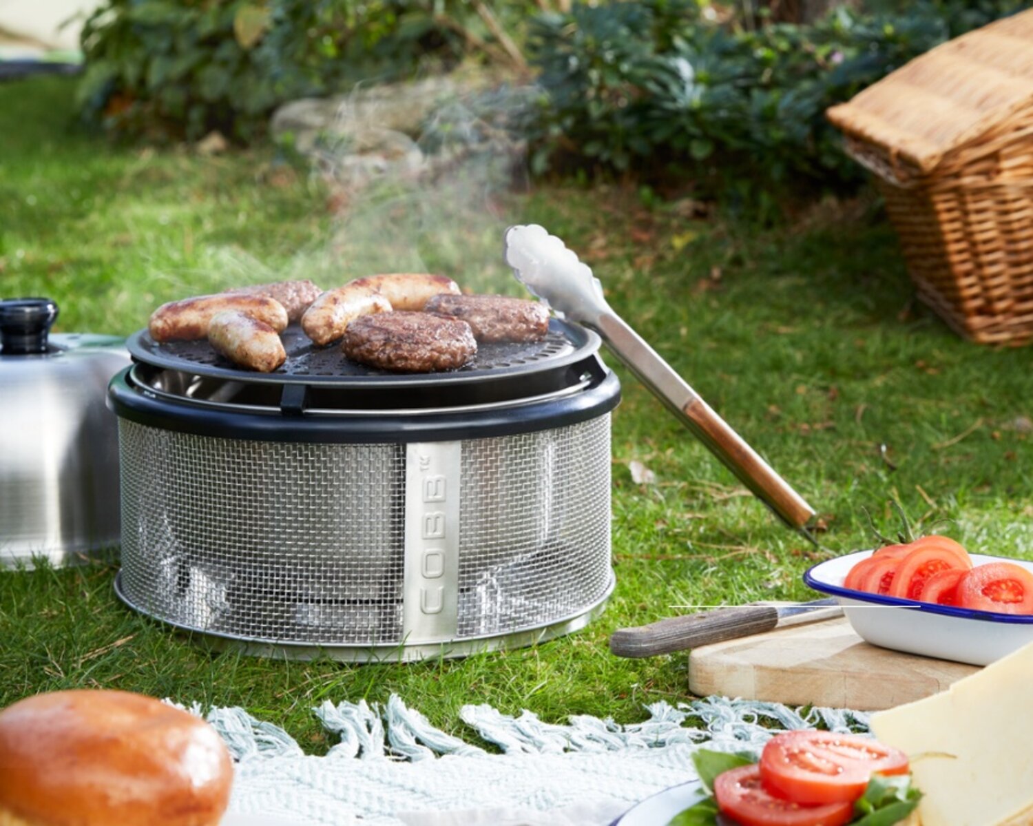 This portable Cobb BBQ is your dream camping cooker