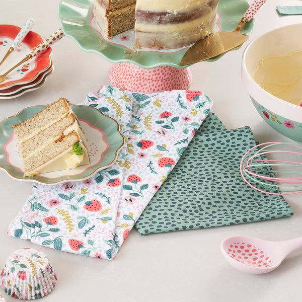 Strawberry Patch Tea Towels on a kitchen counter.